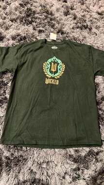 Wicked Movie Logo Graphic Tee in Forest Green